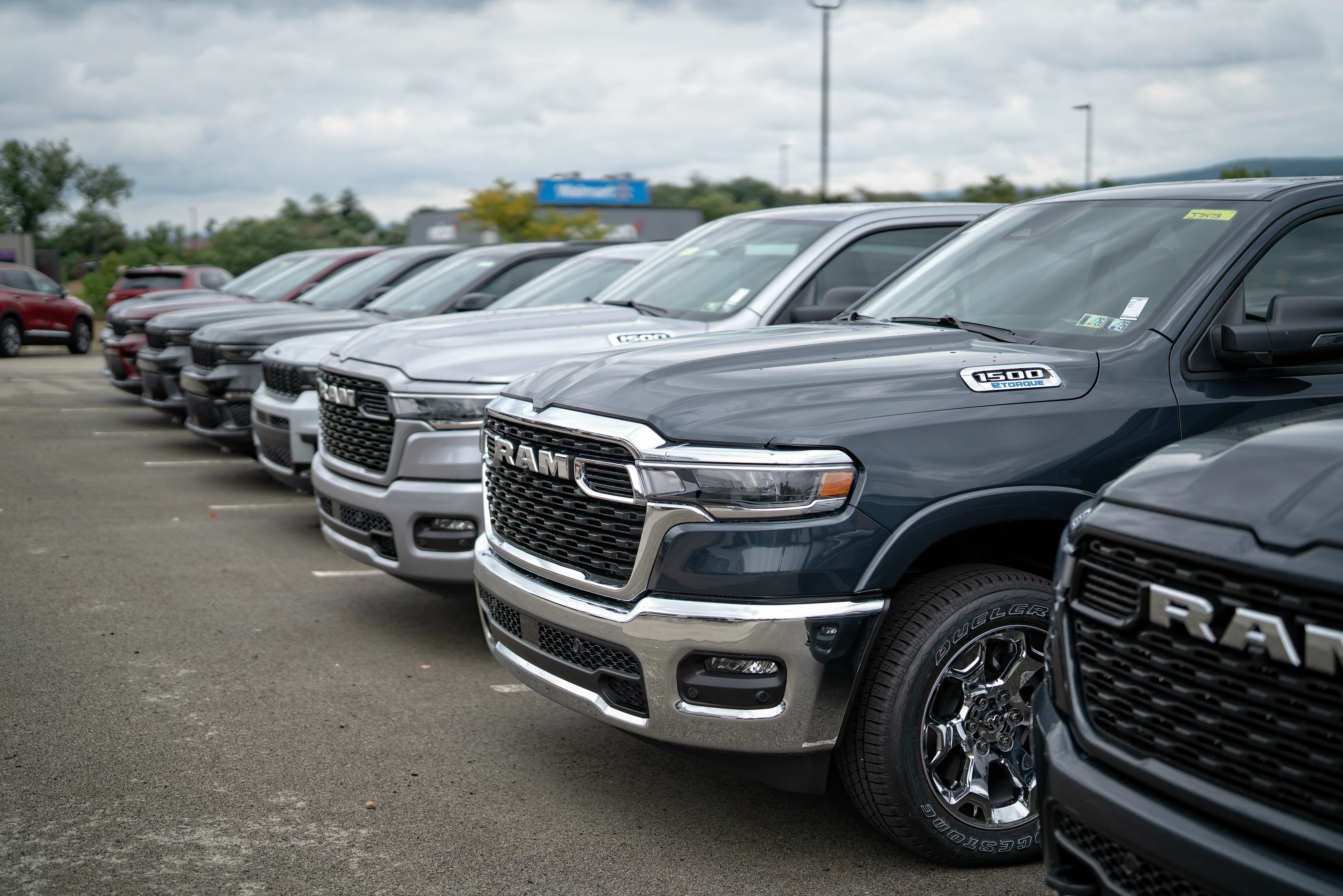 Ram trucks for sale lined up outside of CDJR dealership