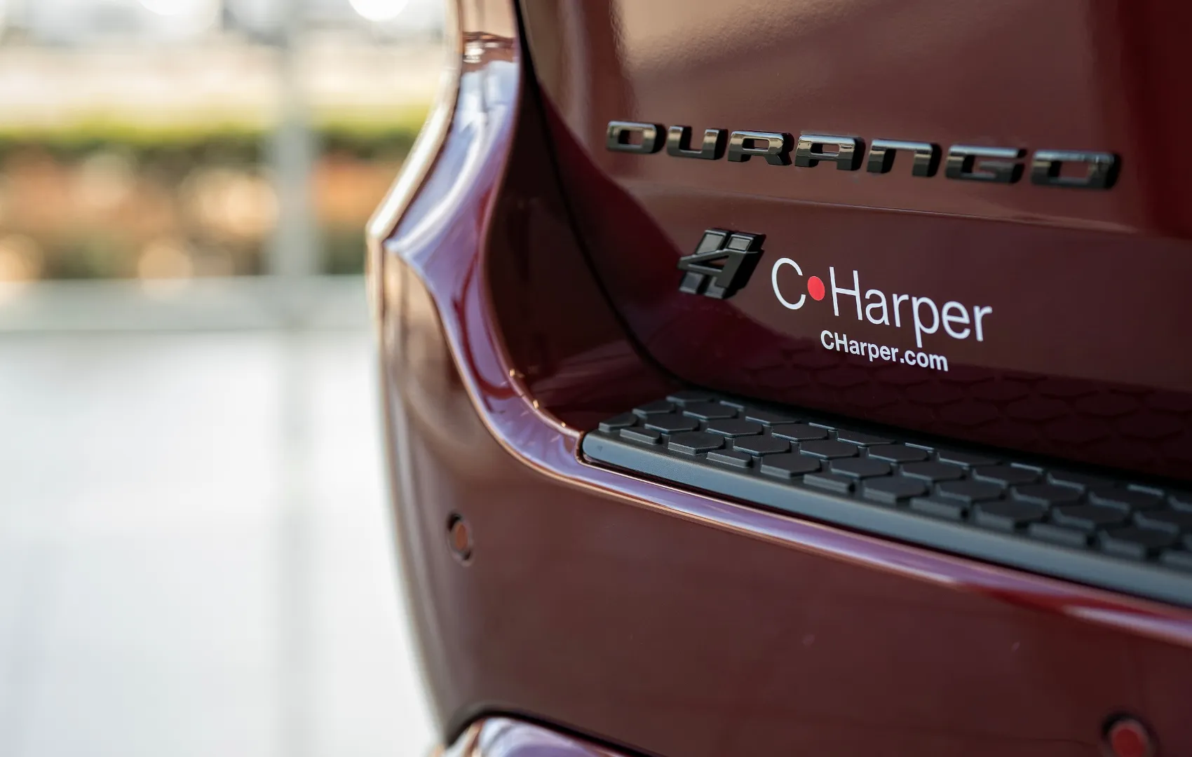 Back of new Dodge Durango sitting in C. Harper CDJR Connellsville showroom